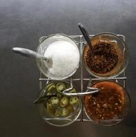 Toppings on metal tray photo