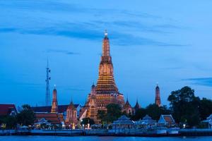 Wat Arun temple in Bangkok at night photo