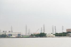 Power plant at the river in Bangkok photo
