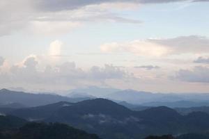 Mountains covered with fog in Thailand photo