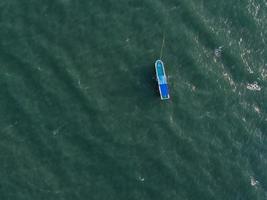 Aerial view of holiday boat on the ocean photo