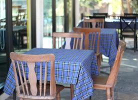 Tables with blue tablecloth photo