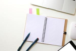 Spiral notebook on desk photo