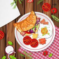 Top view of croissant with food element on the table vector