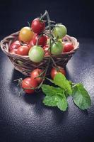 Tomatoes in a basket photo