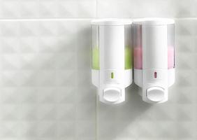 Shampoo dispensers in shower photo