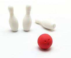 Miniature bowling ball and pins photo