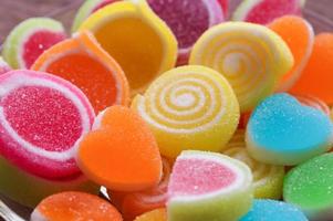 Sweet candy in heart shape photo