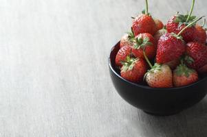 Fresh strawberries in a bowl photo