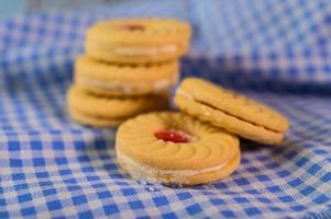 Sandwich cookies with strawberry cream photo