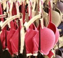 Row of bras hanging in store