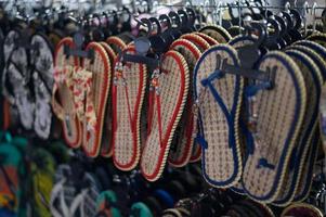 Handmade slippers in a shop in Thailand photo