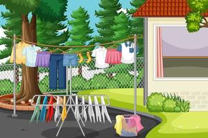 Clothes hanging on line in the yard vector