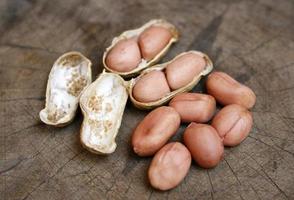 Peanuts on wood photo