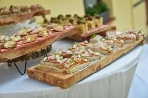 Mini canapes on serving boards photo