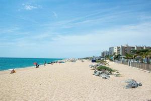 People sunbathing in Spain photo