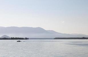 Fishing boat on the lake photo