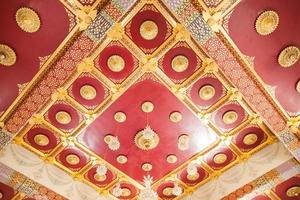 Ceiling design of a temple in Thailand photo