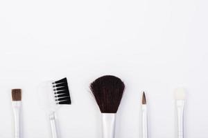 Make-up brushes isolated on white background photo