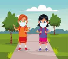 little girls using face masks for covid19 in the park vector