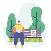 young man using laptop in the park vector