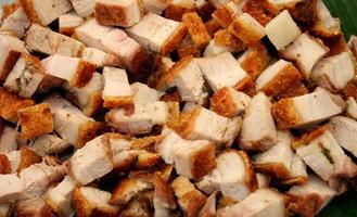 Pile of cubed pork photo