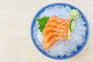 Salmon sashimi on ice serve photo