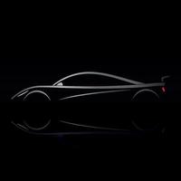 Sports car design on black background with reflection.