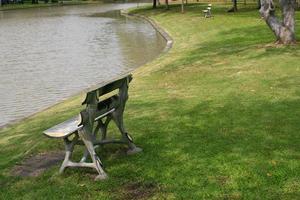 Bench near a pond photo