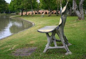 Wood bench near water photo