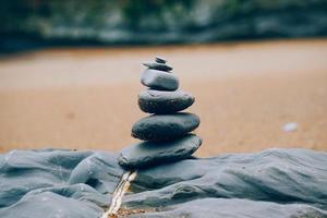 Stones balancing on the beach photo
