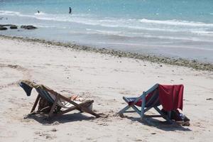 Sunbathing beds on the beach photo