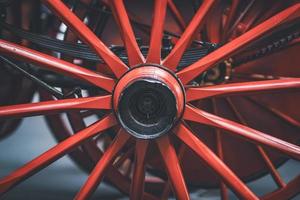 Antique wooden wheel of a classic fire truck photo