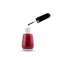Close-up of red nail polish isolated on white background photo
