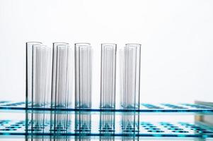 Science tubes arranged on a shelf photo