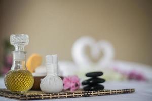 Bottle of essential oil and spa treatments photo