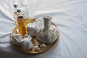 Bottle of essential oil and spa treatments photo