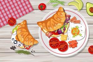 Top view of croissant with food element on the table vector