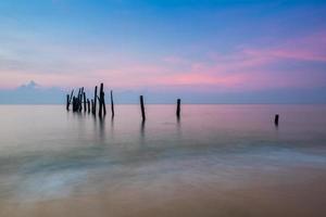 Colorful sunrise over ocean photo