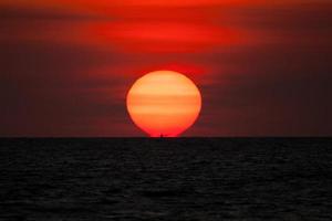 Magnified sun at sunset photo