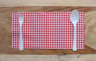 Tablecloth with plasticware photo