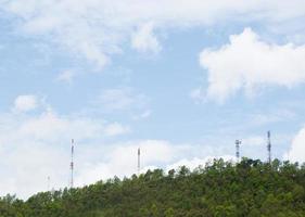 Telecommunications towers in the forest photo