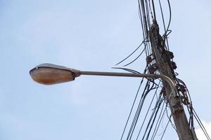 Wires and street lamp photo