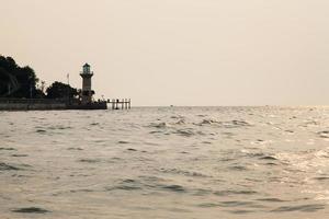 Lighthouse at the coast photo