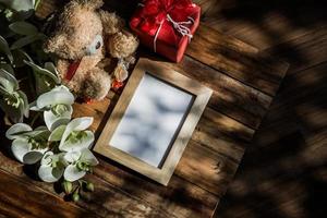 Top view of photo frame with tree shadow