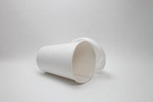 Paper cup on white background photo