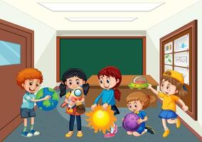 Children holding their planet models in the classroom scene vector