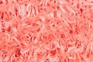 Cerca de la alfombra de algodón rosa suave