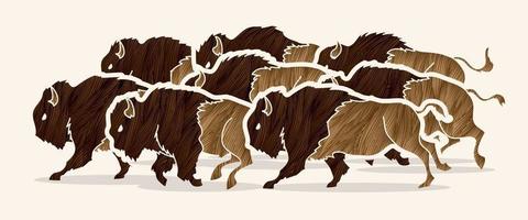 grupo de bisontes o búfalos corriendo vector