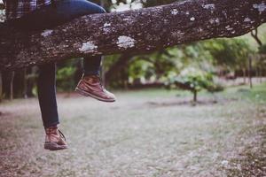 Rear of young hiker enjoying nature photo